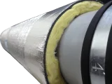 Sound Seal acoustic lagging layers wrapped around a pipe